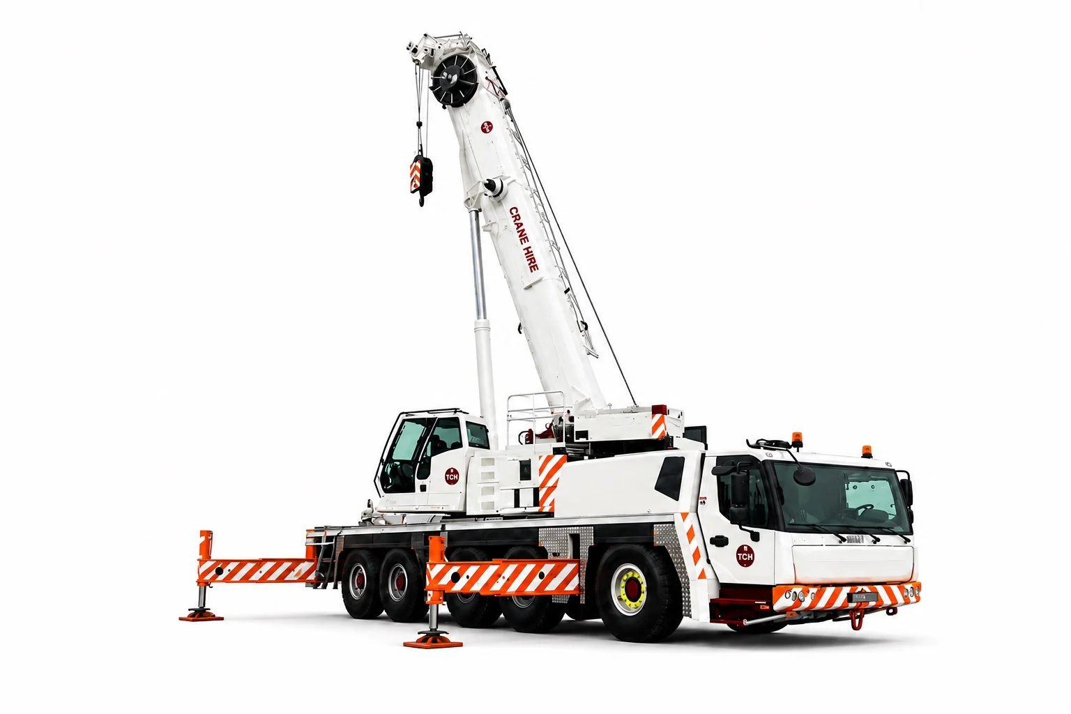 White mobile crane with boom raised and outriggers extended